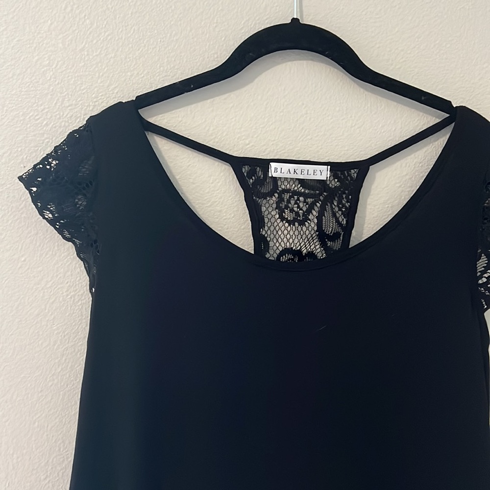 Blakeley black top with lace shoulders and back